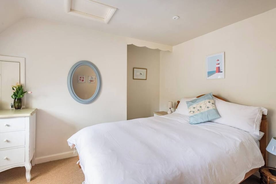 Comfortable double bed with additional single when required in second bedroom