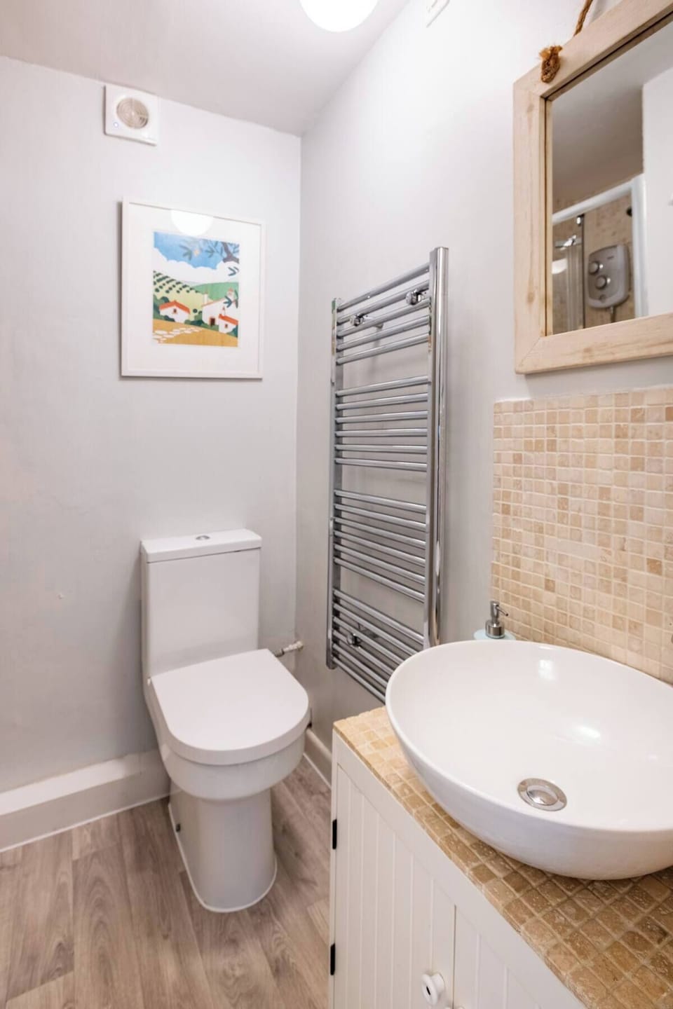 Upstairs shower, loo and heated towel rail 