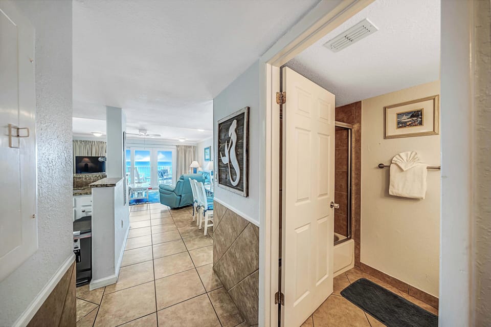 There is a second full bathroom located off the hall that offers a tub/shower combo.