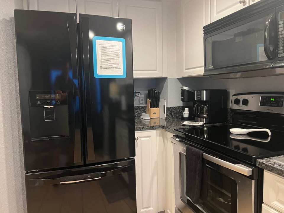 Kitchen - Stove, Fridge, Microwave and Dishwasher