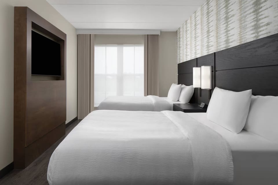Settle in comfortably with two plush beds for easy sharing.