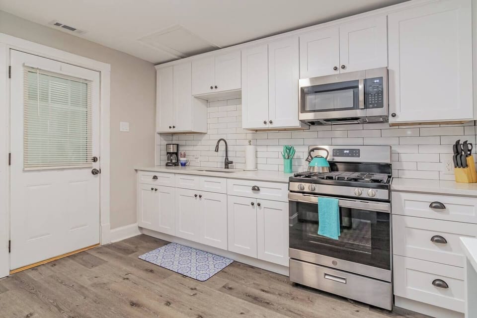 Equipped with the basic needs such as pots and pans, plates, glass, mugs, mixing bowl, spoon and fork, knife block, cutting board, cooking utensils