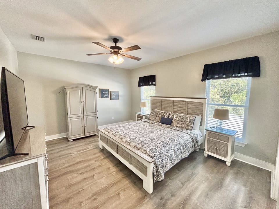 Master bedroom overlooking pool
