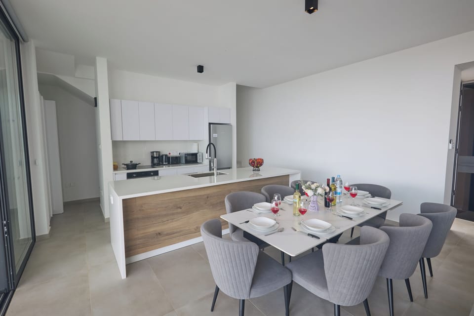 Dining Area with table and chairs to seat 8 people