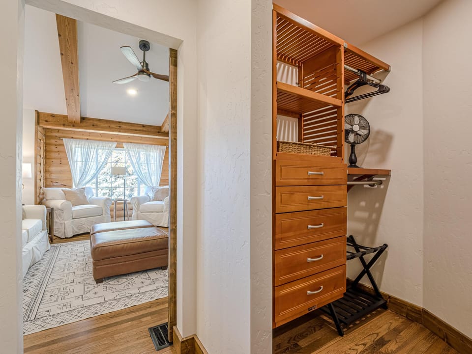 With ample space and thoughtful design, this closet makes staying organized effortless and elegant.