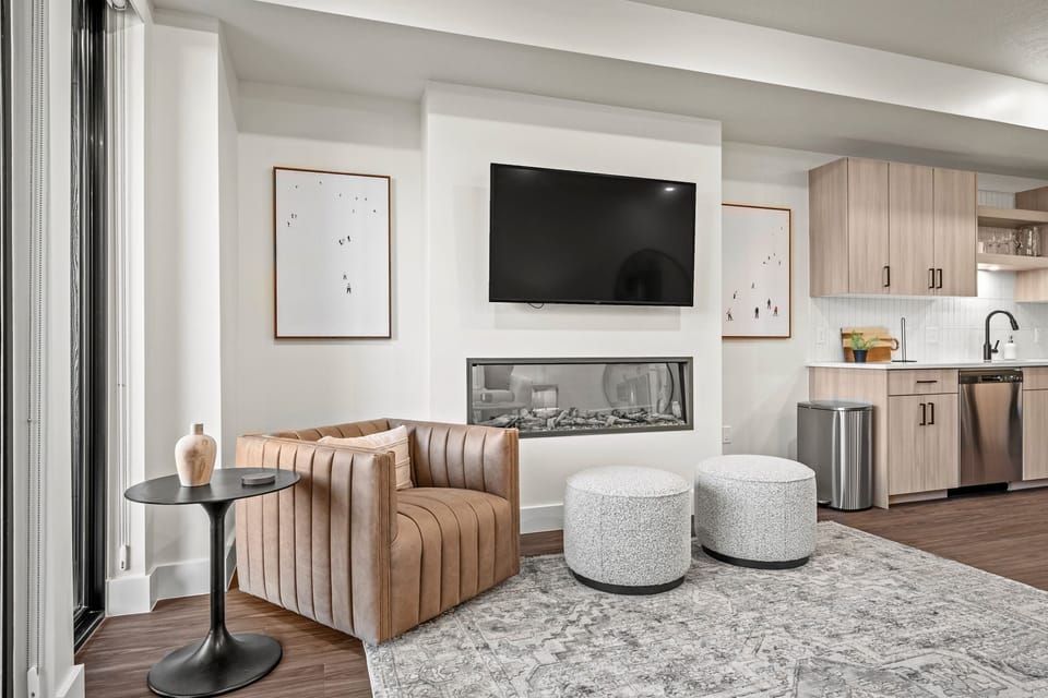 The electric fireplace adds a warm ambiance and a gentle glow.