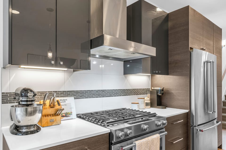 Full sized kitchen complete with all cooking utensils, pots, and pans