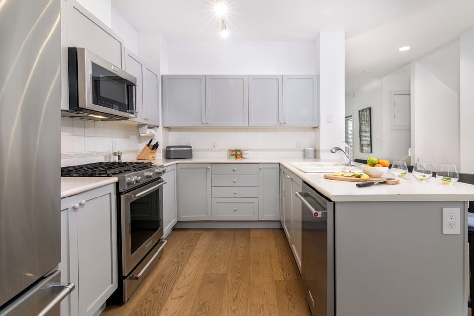 Spacious, fully equipped kitchen with modern appliances and ample counter space.