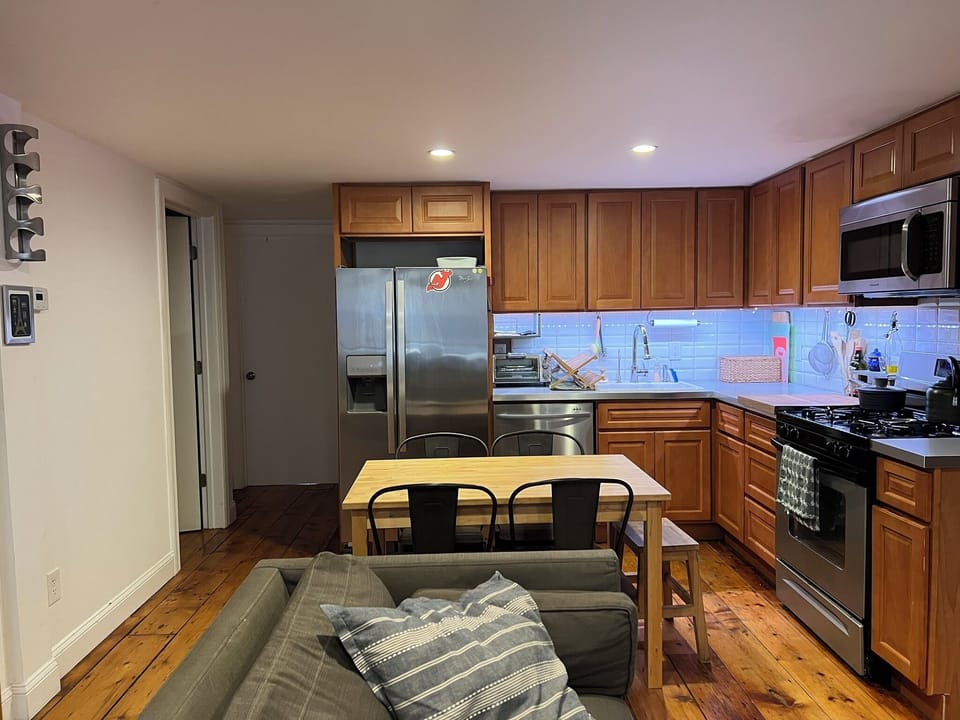 Kitchen looking toward bedroom doors