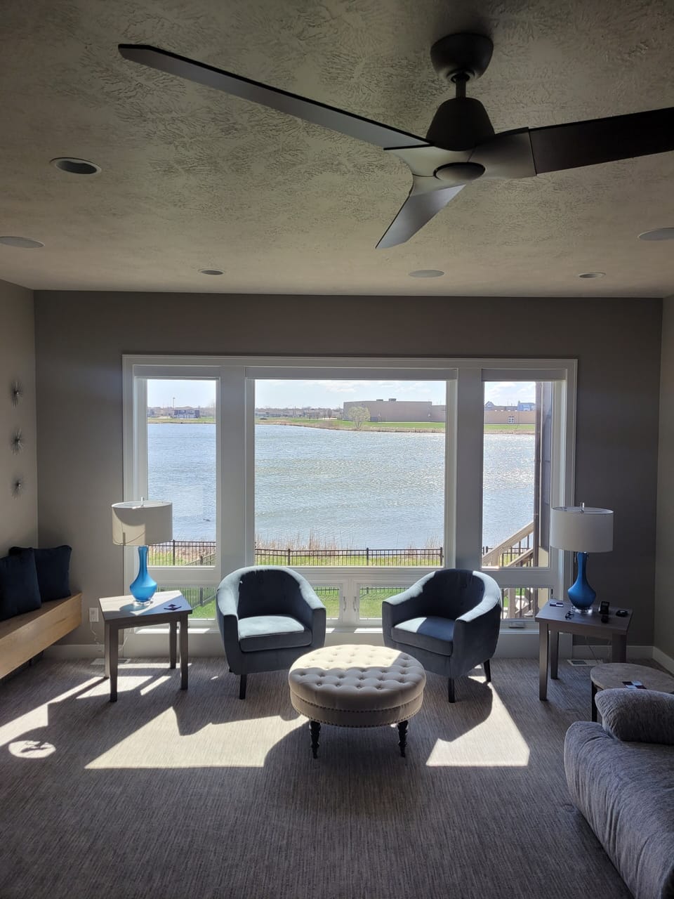 Main level living area with pond view