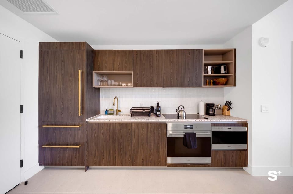 Fully equipped kitchen with stainless steel appliances