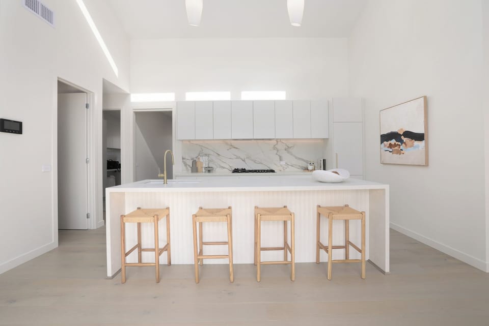 Kitchen that opens up to the deck and pool area