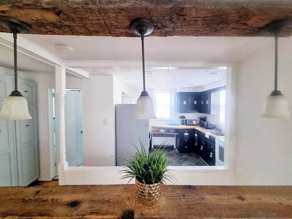 Step into a well-appointed kitchen designed for convenience. It includes a full-sized refrigerator, range, and plenty of counter space for meal prep. You'll find generous storage in the cabinetry, making it easy to keep things organized.
