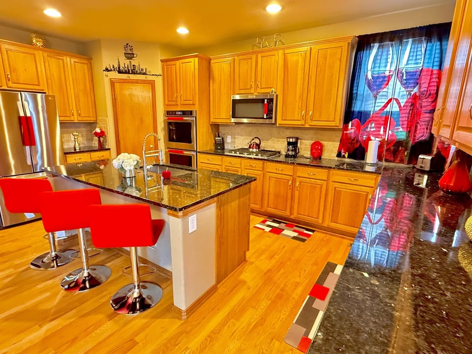 Spacious kitchen with elegant granite countertops, perfect for cooking and entertaining