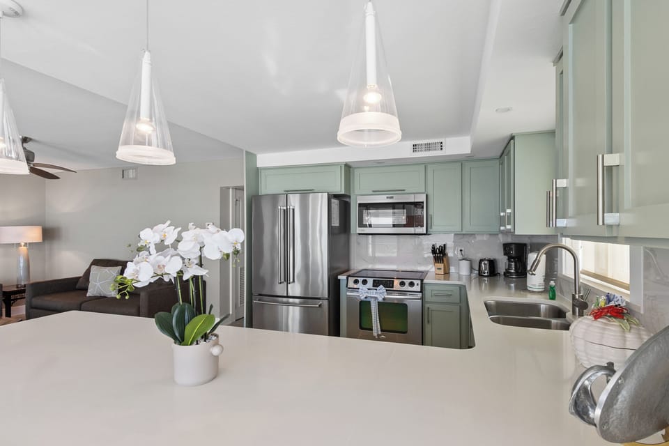 Kitchen with Stainless Steel appliances.