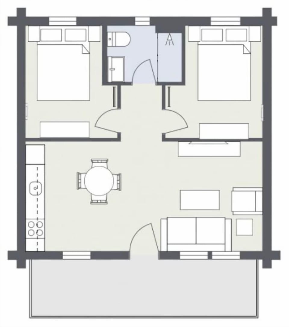 The layout of the Double Queen Suite includes two cozy queen beds, a spacious living area, a dining space, and a well-equipped kitchenette for your convenience.