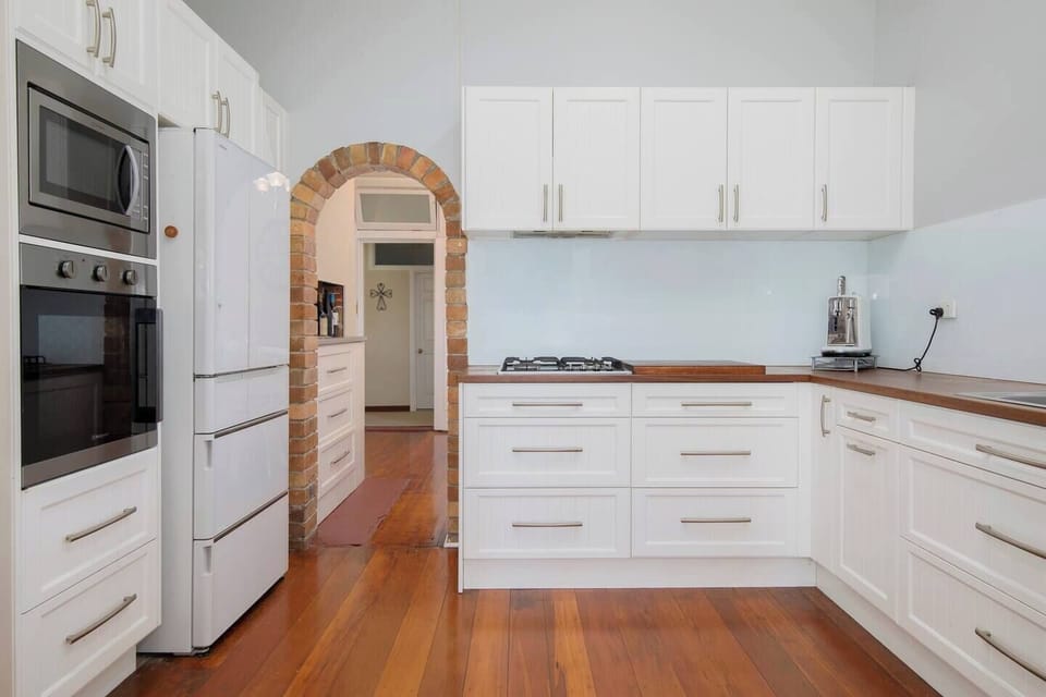 The generous kitchen has all you need to cook up a feast at home, plus a dishwasher for easy clean-up. 

