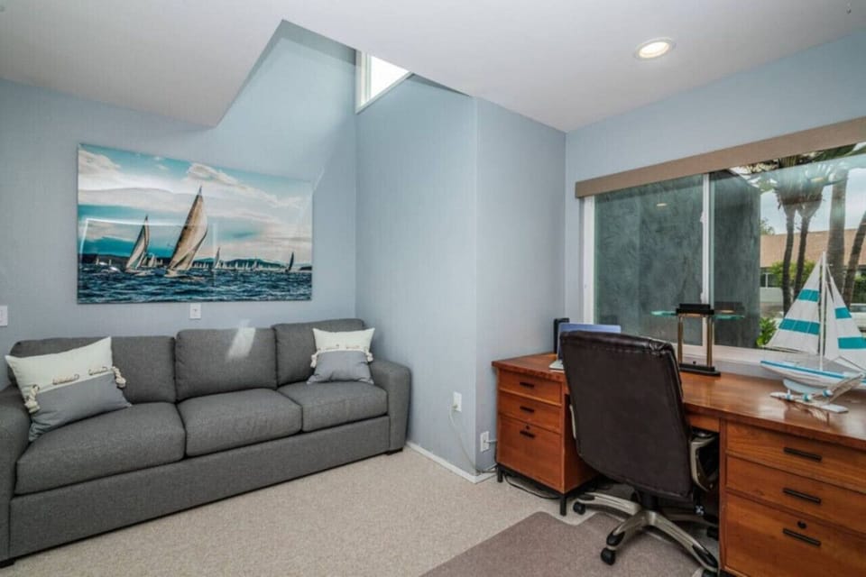 Bedroom 1 with a work station and sleeper sofa