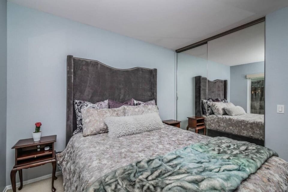 Bedroom 3 features a queen size bed