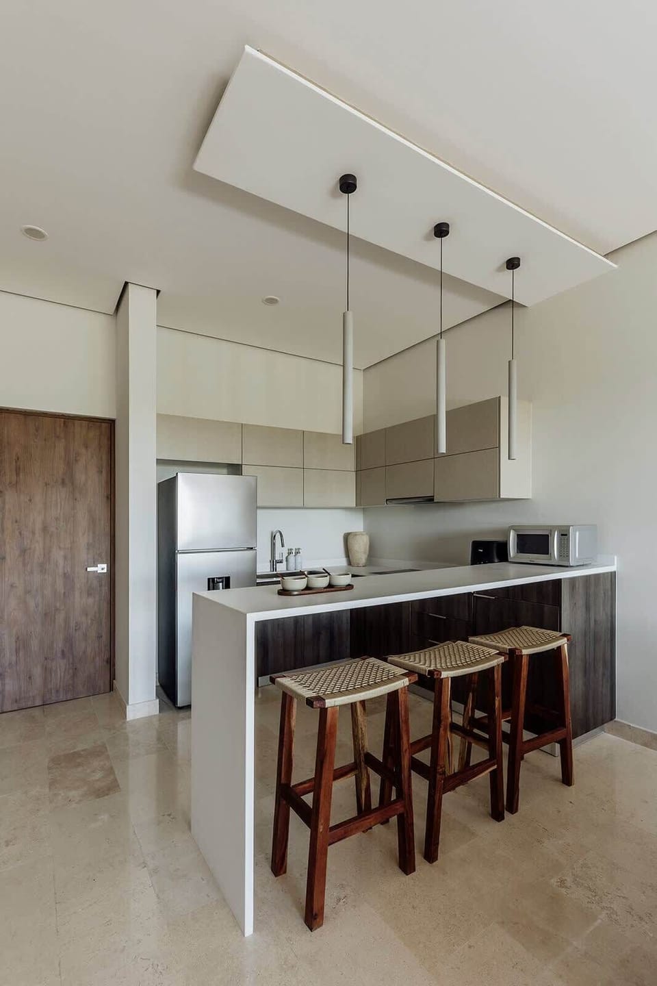 Kitchen with counter stools