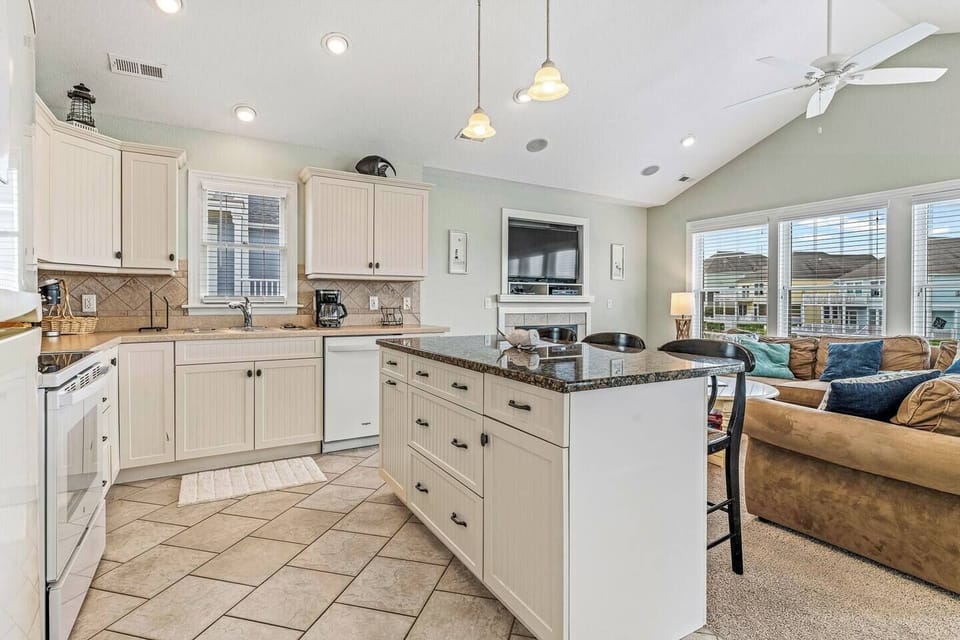 Prep a meal while enjoying the scenic views from the amazing floor to ceiling windows!