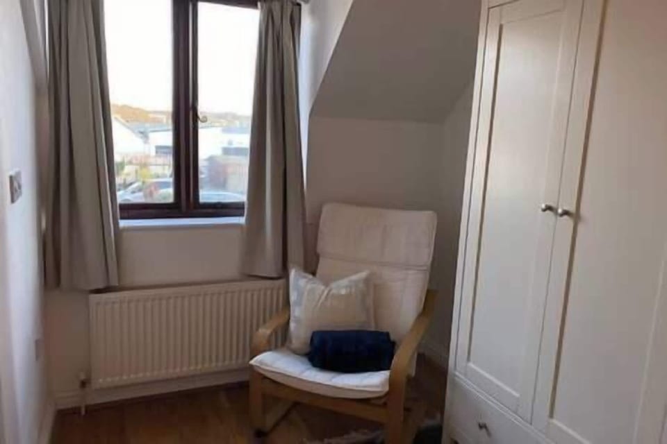 Upstairs Main Bedroom with Wardrobe and En-suite Toilet/Shower Room