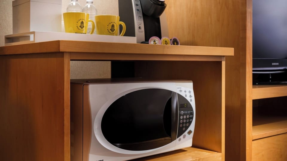 Heat up snacks quickly with the convenient in-room microwave.