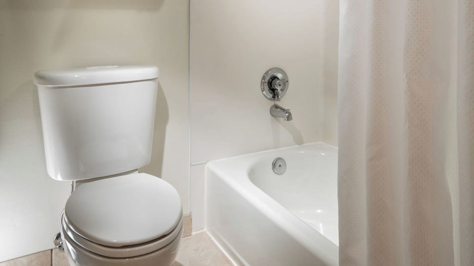 Soak off the day in a clean tub-shower combo.