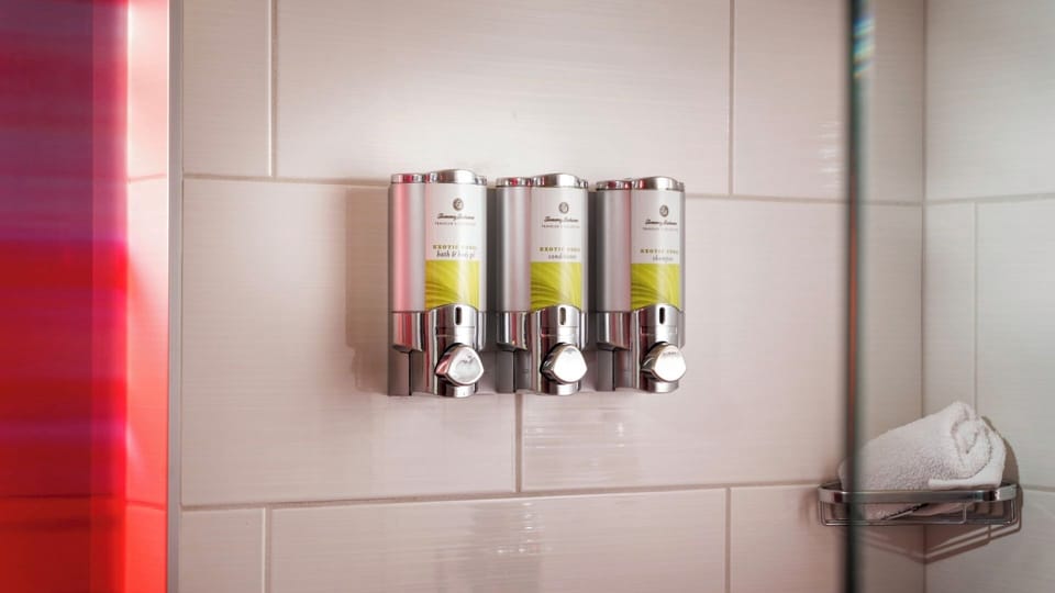 Enjoy spa-like touches with wall-mounted toiletries and fresh towels