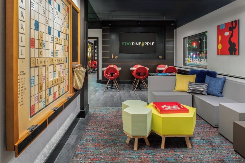 Snap a quick pic beside colorful bikes and bold lobby design.