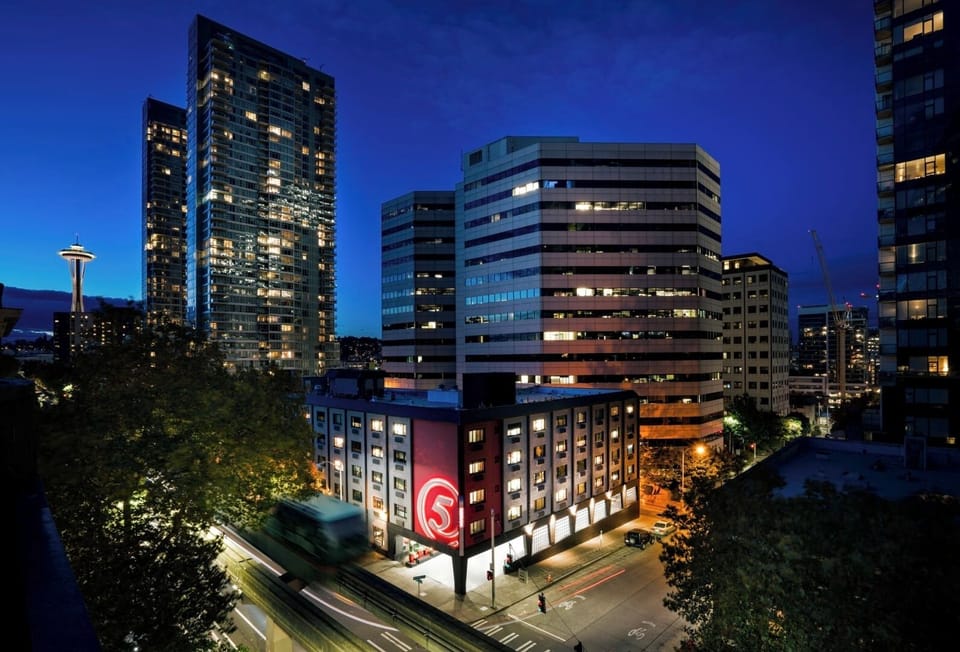 Soak in dazzling city lights from this iconic exterior view.