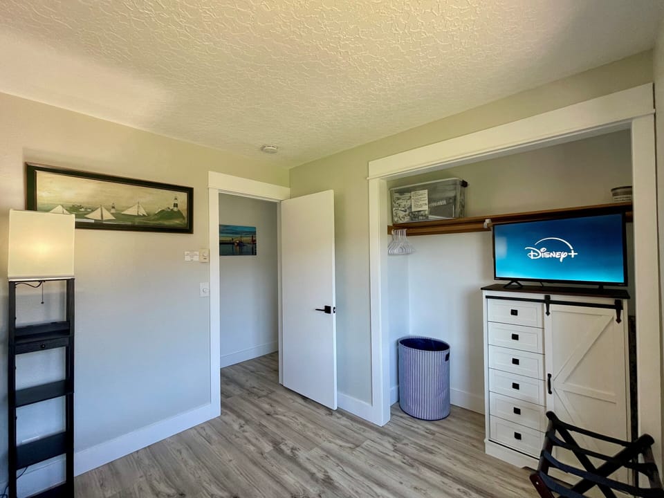 Bedroom 3, Roku TV, closet, dresser and extra linens.