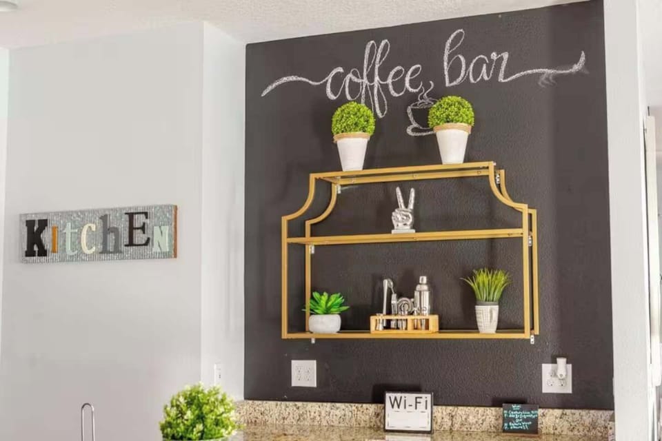 A chic touch of warmth and personality — this custom coffee bar nook adds a boutique-hotel feel to your mornings before a day of Florida sunshine.