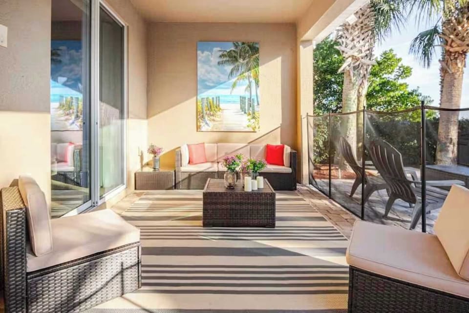 ☀️ Endless Summer Vibes! Relax on the shaded patio with comfy seating and tropical views — the perfect spot for morning coffee, evening cocktails, or simply soaking in the Florida sunshine. 🌴🍹✨