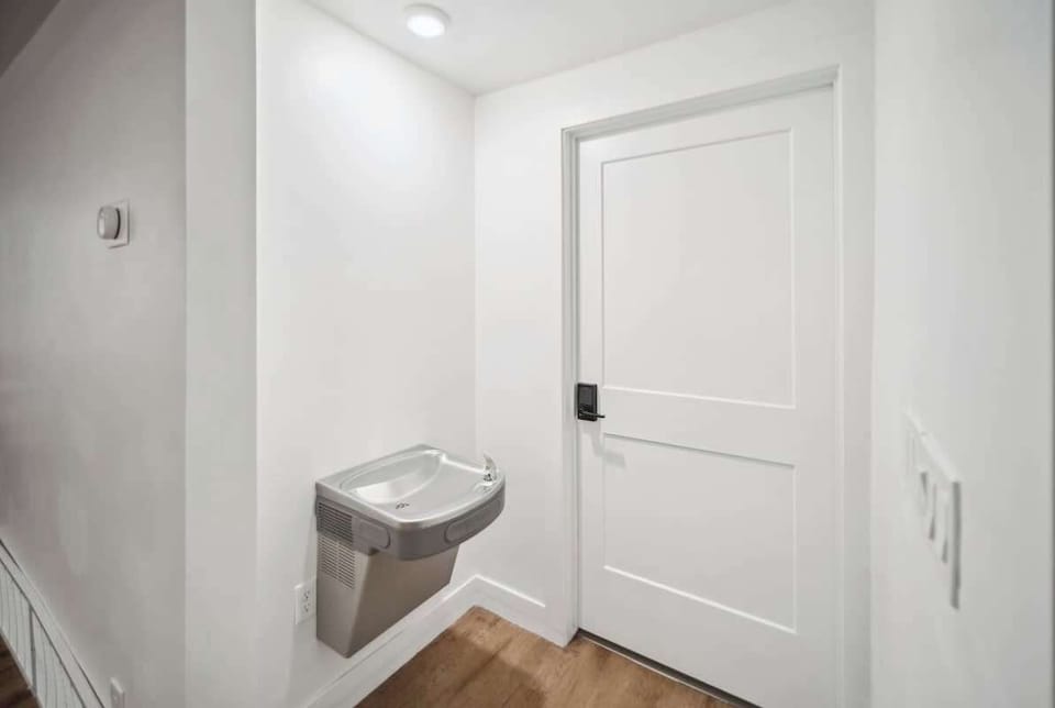 Downstairs drinking fountain by kids playroom area