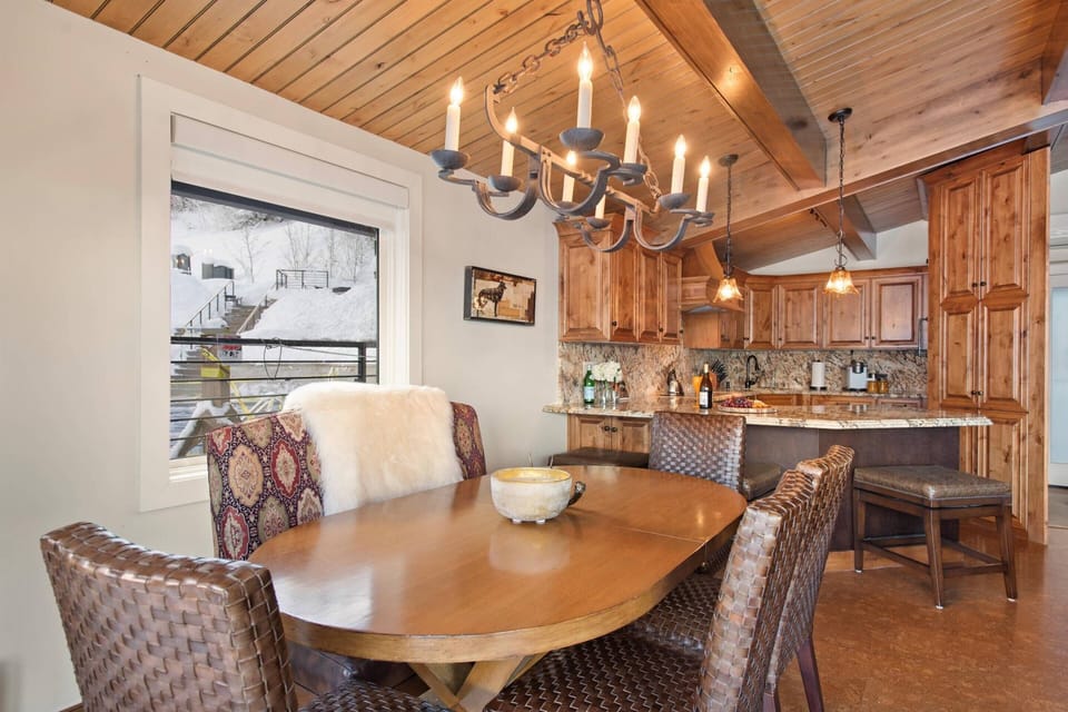 The dining table seats 6 and the breakfast bar seats 3 - plenty of space for your group to enjoy dining together at home during your visit.