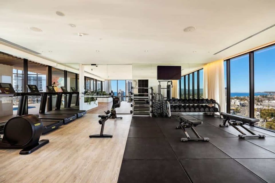 Fully equipped commercial-grade gym featuring state-of-the-art fitness equipment for all your workout needs.