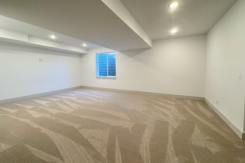 The downstairs living space is entirely open, making it a perfect space for little ones to romp around and burn off some energy.