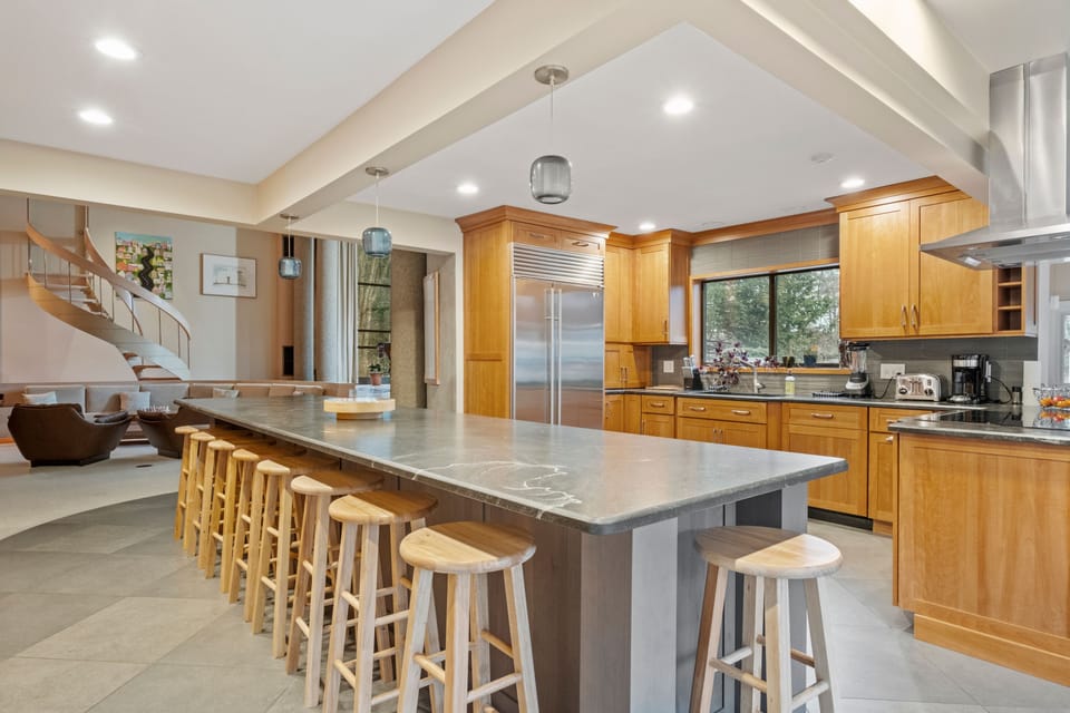 Kitchen looks out into the living room.