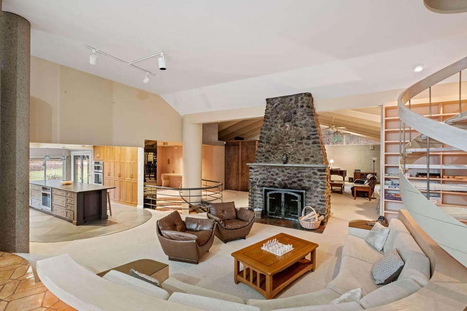 The entire first floor is completely open, so you can spread out but all still be together! (Fireplace is not available for use.)