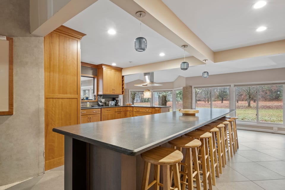 Large kitchen island with plenty of seating.