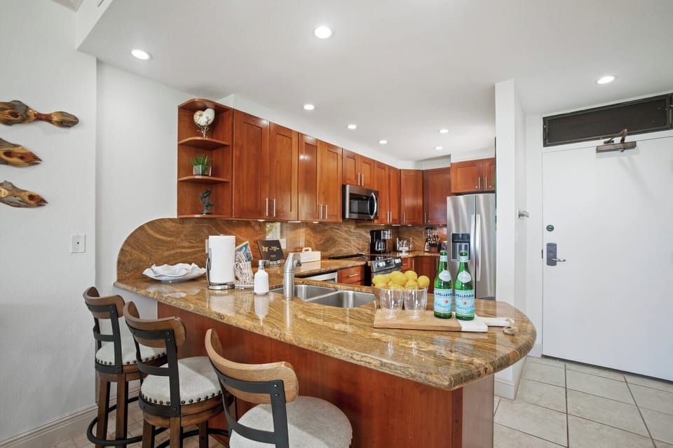 Whip up smoothies, sauté shrimp, or just dance barefoot—this curved-countertop cutie is your culinary playground  
