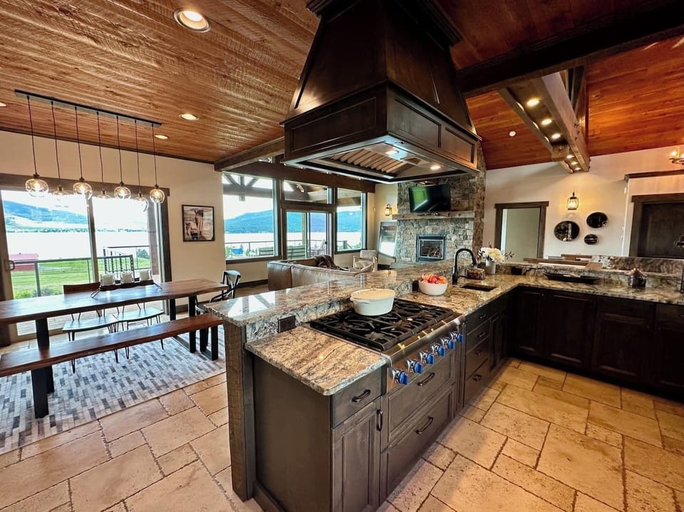 Enjoy meals at the dining room table where you can comfortably seat 7-8 and the 5-stool raised counter. You can also take your meals outside to enjoy on the deck.