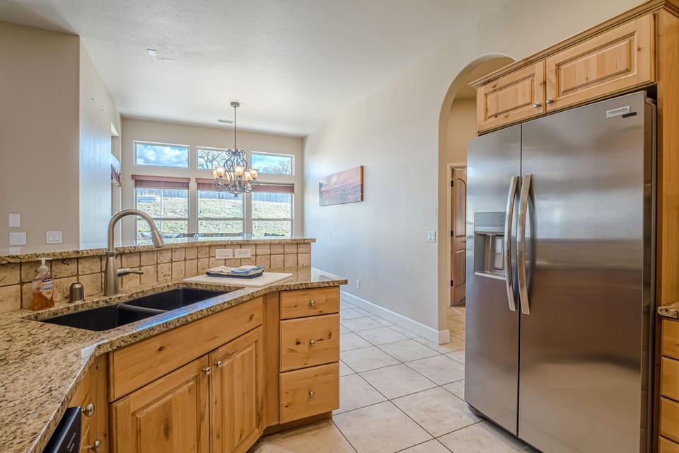 The large side by side refrigerator offers plenty of space to keep your food stored as well as providing ice and chilled, filtered water on demand.