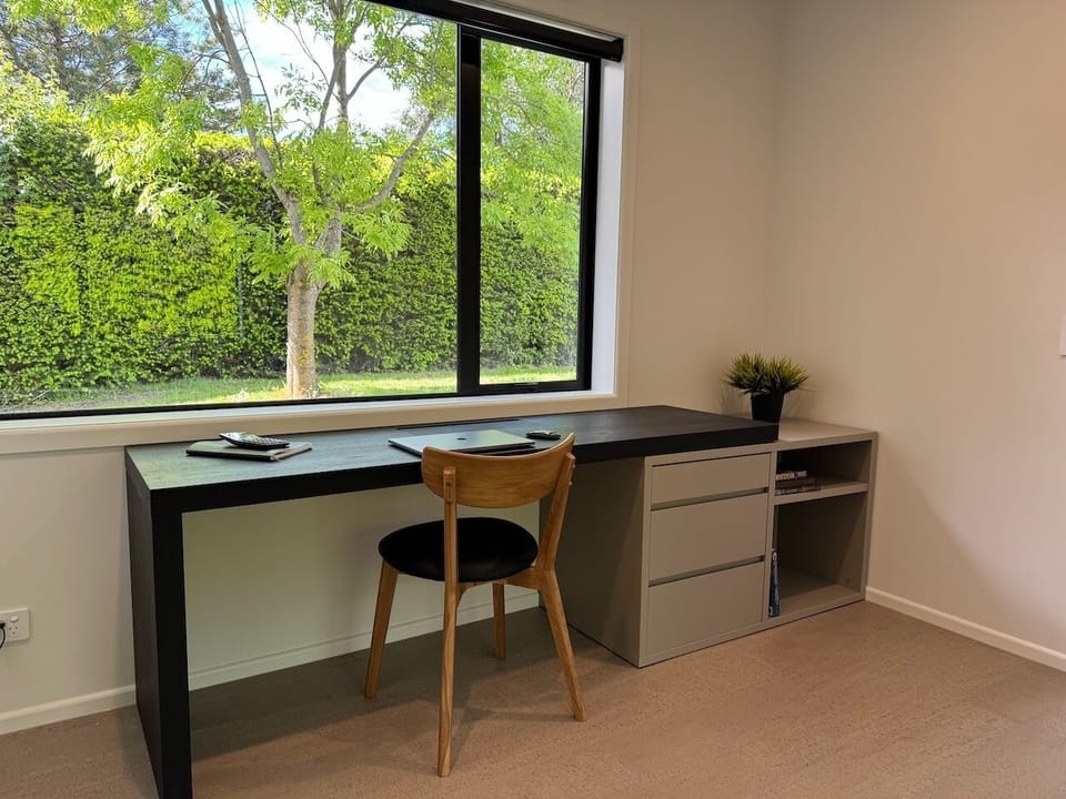 Dedicated office space adjoins the second living area/media room