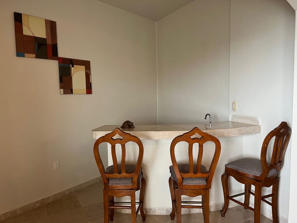 Wet bar adjacent to the living room