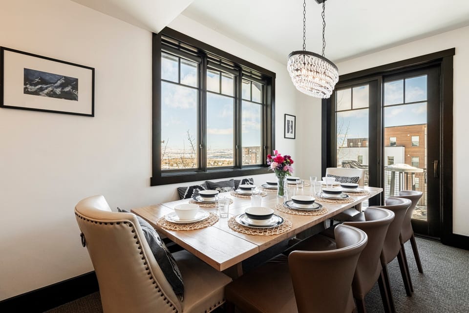 Dining area with seating for up to 9 and private balcony