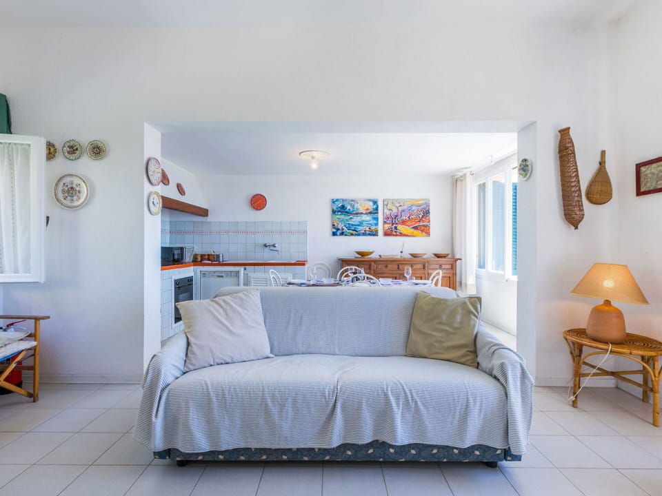 Furniture, Couch, Interior Design, Wall, Living Room, Textile, Room, Flooring, Floor, Table