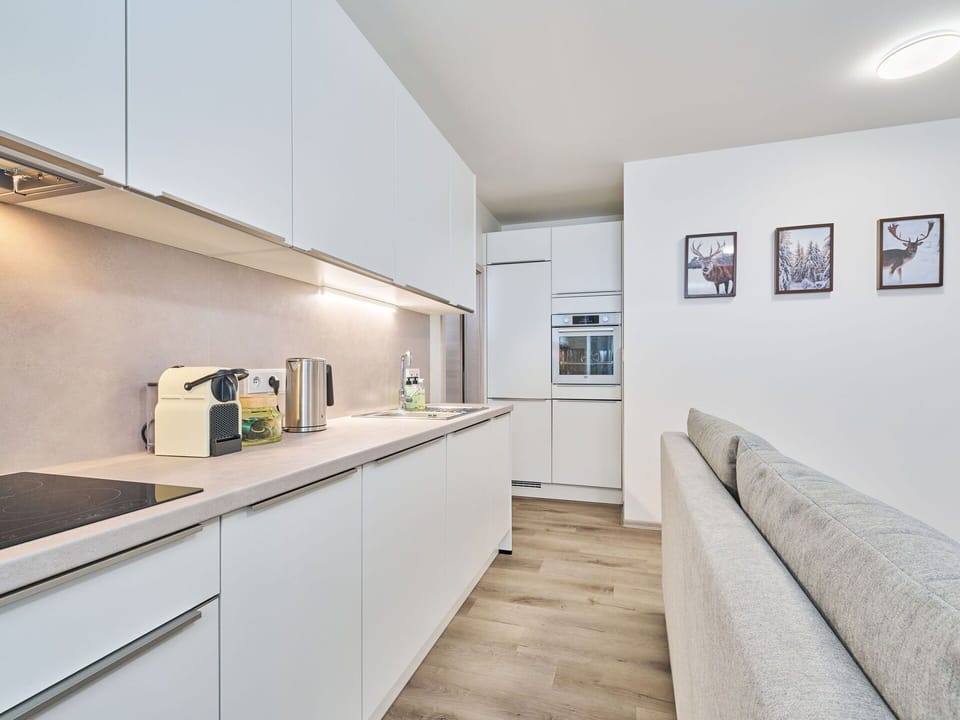 Interior Design, Flooring, Kitchen, Countertop, Ceiling, Kitchen Appliance, Floor, Room, Furniture, Major Appliance