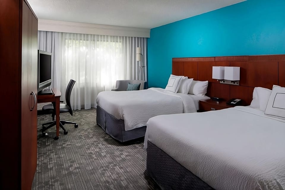 Stretch out with extra space around two inviting queen beds.